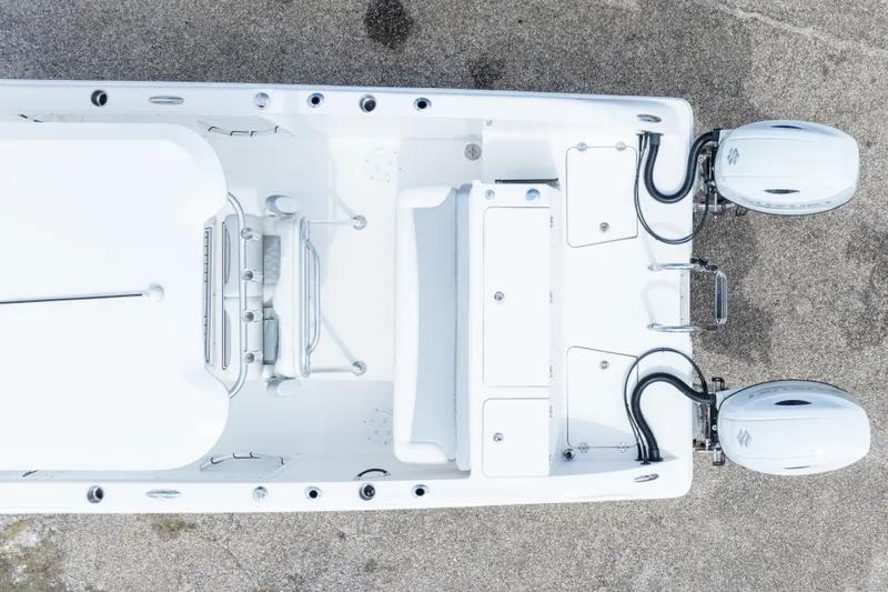 Slide: The Image of Overhead view of 2022 Twin Vee 240 GFX CC boat with dual engines. - 45