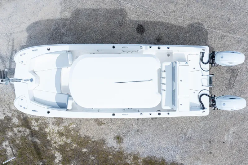 Slide: The Image of Overhead view of 2022 Twin Vee 240 GFX CC boat with dual engines. - 46