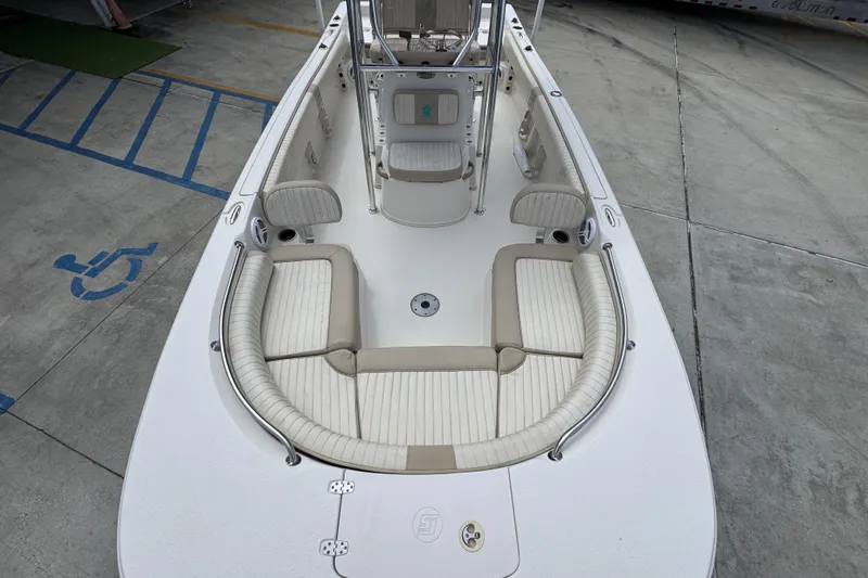 Slide: The Image of 2019 Carolina Skiff 21 Ultra Elite boat interior with seating and console. - 20