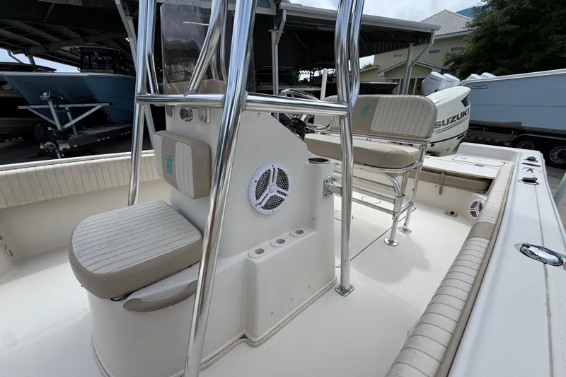 Slide: The Image of 2019 Carolina Skiff 21 Ultra Elite boat interior with seating and console details. - 23