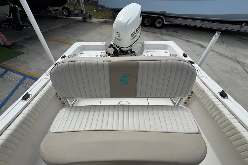 Slide: The Image of 2019 Carolina Skiff 21 Ultra Elite boat interior with Suzuki outboard motor. - 26