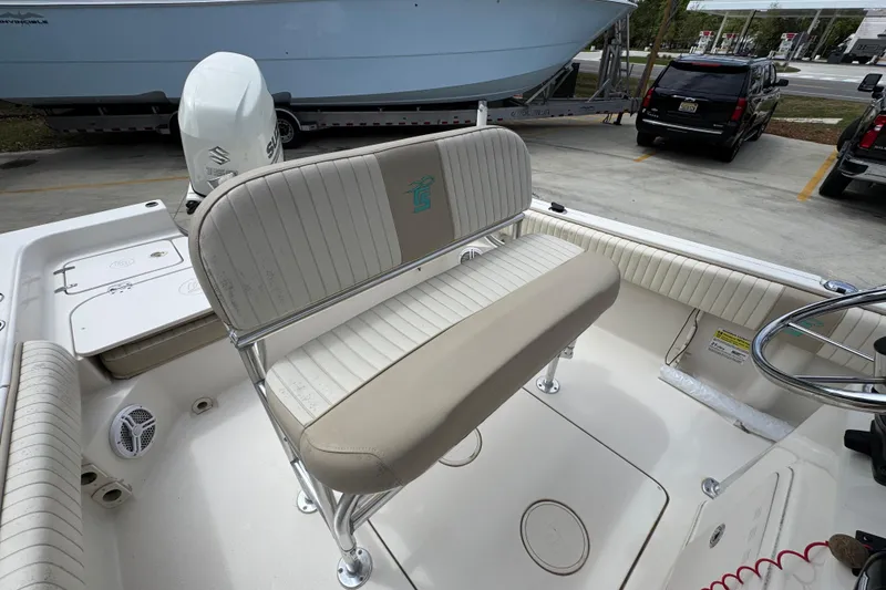 Slide: The Image of 2019 Carolina Skiff 21 Ultra Elite boat interior with seating and steering wheel. - 28