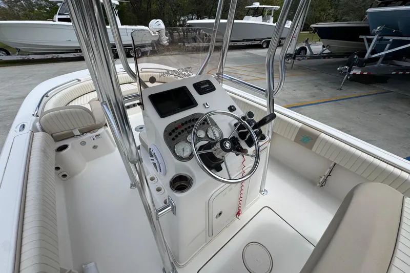 Slide: The Image of 2019 Carolina Skiff 21 Ultra Elite boat interior with steering console and seating. - 29
