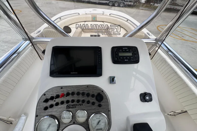 Slide: The Image of 2019 Carolina Skiff 21 Ultra Elite boat dashboard with Garmin navigation system. - 31