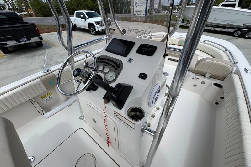 Slide: The Image of 2019 Carolina Skiff 21 Ultra Elite boat interior with steering console and seating. - 32