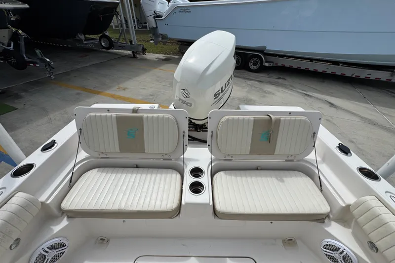 Slide: The Image of 2019 Carolina Skiff 21 Ultra Elite boat interior with Suzuki outboard motor. - 36