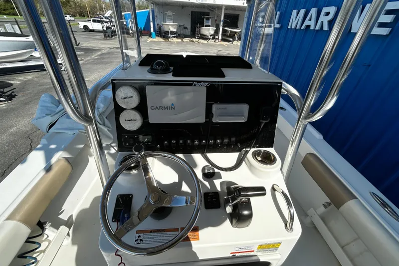 Slide: The Image of Control panel of a 2019 Parker 21 Special Edition boat with Garmin navigation system. - 11