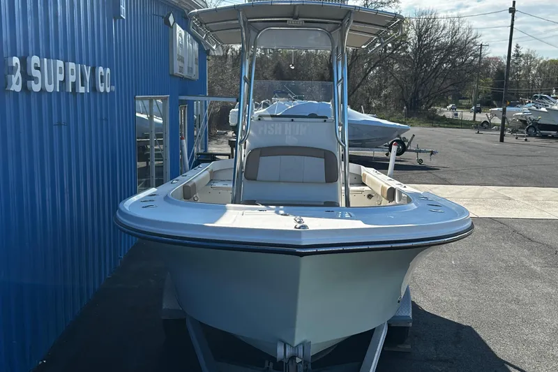 Slide: The Image of 2019 Parker 21 Special Edition boat displayed at a marine supply company. - 2