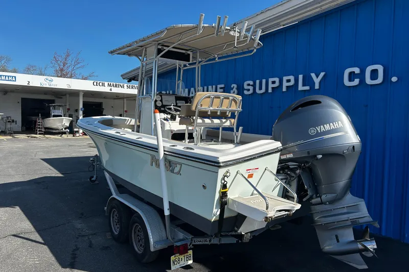Slide: The Image of 2019 Parker 21 Special Edition boat with Yamaha engine at marine service center. - 3