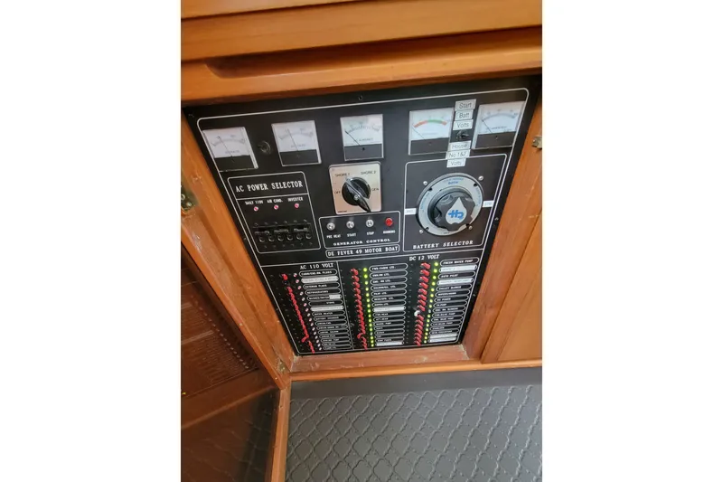 Slide: The Image of Electrical control panel on a 2001 DeFever Pilothouse boat. - 19