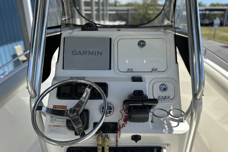 Slide: The Image of 2007 Century 2600 Center Console boat dashboard with Garmin navigation system. - 15
