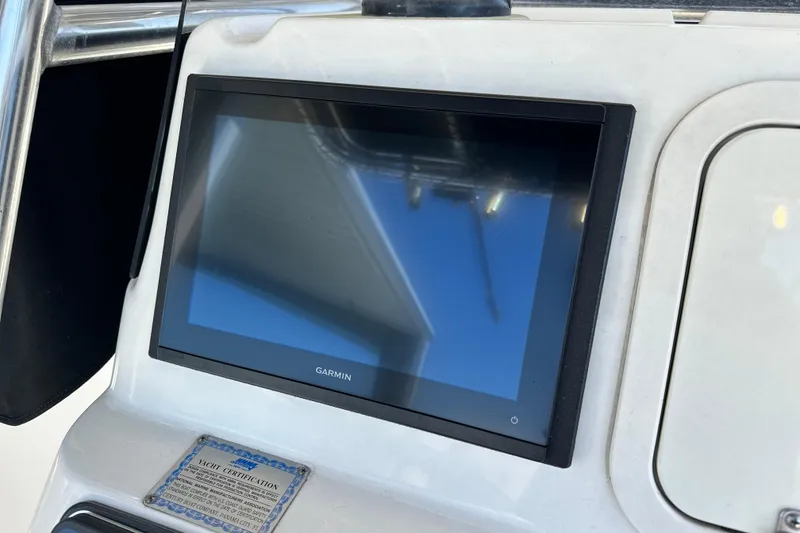 Slide: The Image of Garmin display on 2007 Century 2600 Center Console boat dashboard. - 17
