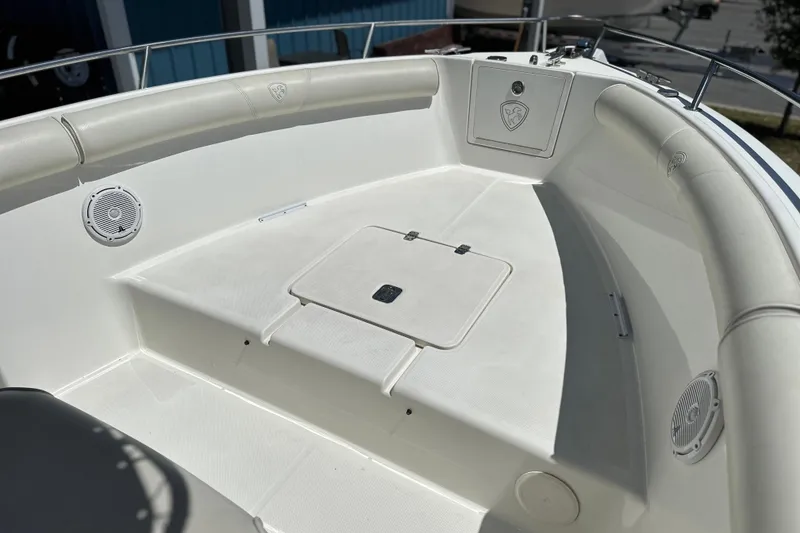 Slide: The Image of 2007 Century 2600 Center Console boat interior with seating and storage compartments. - 18