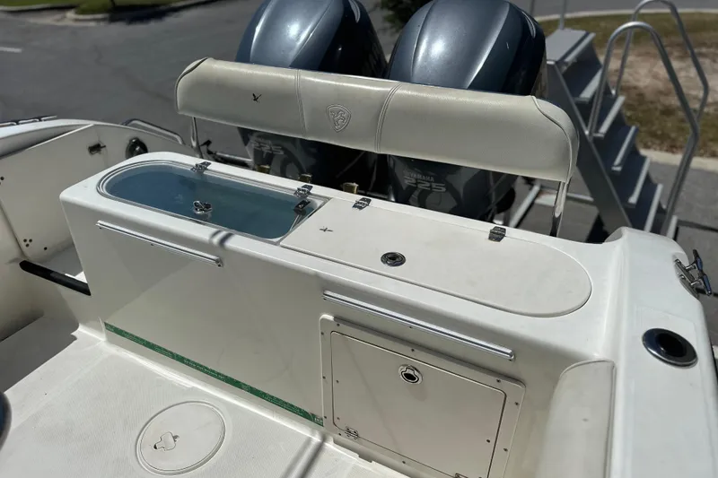 Slide: The Image of 2007 Century 2600 Center Console boat with dual Yamaha engines and fishing amenities. - 20
