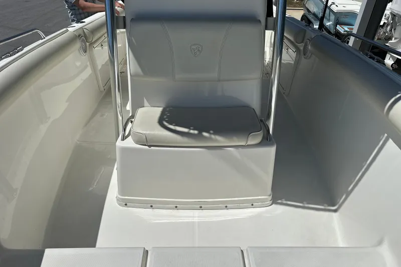 Slide: The Image of 2007 Century 2600 Center Console boat interior with seating and console. - 21