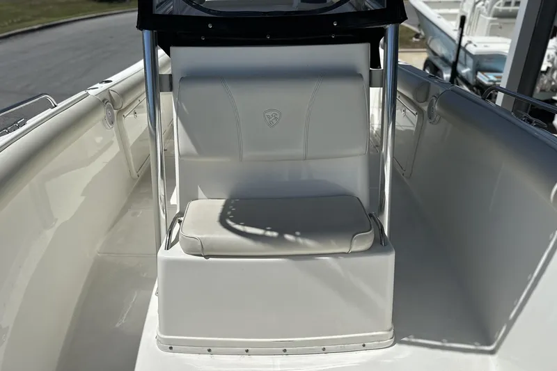 Slide: The Image of 2007 Century 2600 Center Console boat interior with cushioned seating and sleek design. - 23