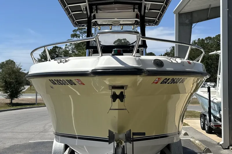 Slide: The Image of 2007 Century 2600 Center Console boat on trailer, parked outdoors. - 4