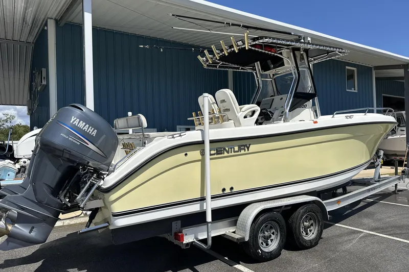 Slide: The Image of 2007 Century 2600 Center Console boat with Yamaha engine on trailer. - 6
