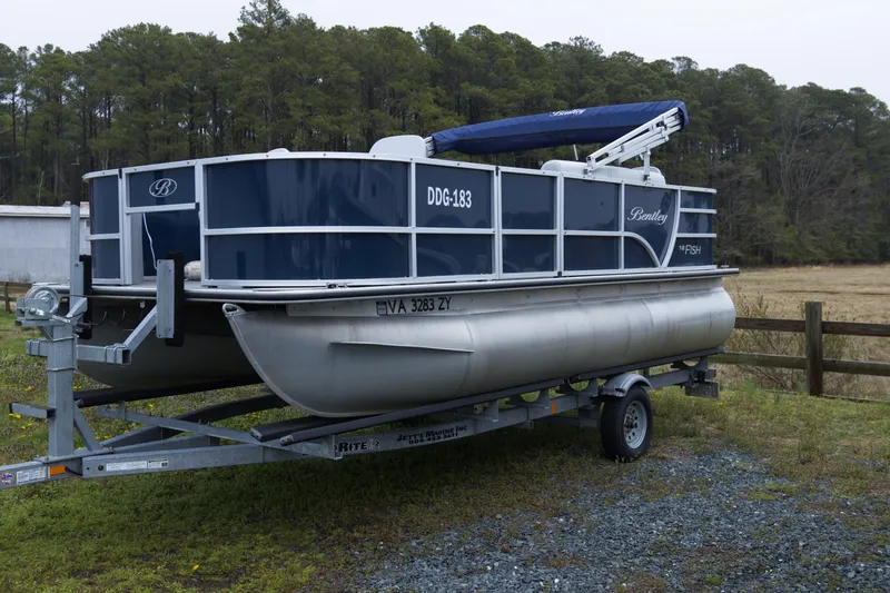The Image of 2022 Bentley Pontoons Lil Bentley 180 Fish on trailer, parked outdoors. - 1