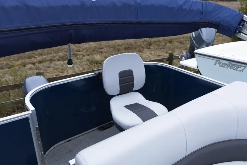 Slide: The Image of 2022 Bentley Pontoons Lil Bentley 180 Fish interior with blue and white seating. - 12