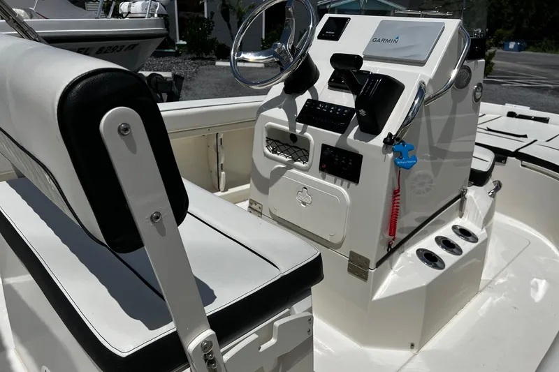 Slide: The Image of 2020 Stingray 186 CC boat interior with steering console and seating. - 6