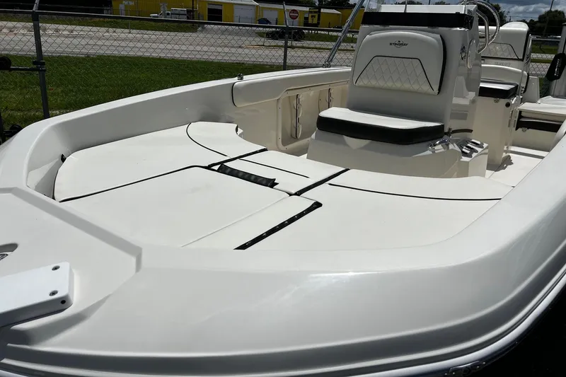 Slide: The Image of 2020 Stingray 186 CC boat interior with seating and storage compartments. - 9