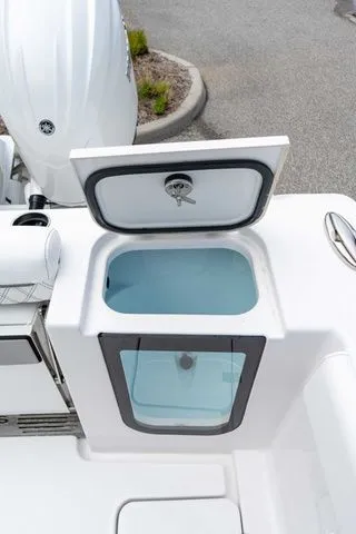 Slide: The Image of 2026 Sportsman Open 262 Center Console with open storage compartment. - 49