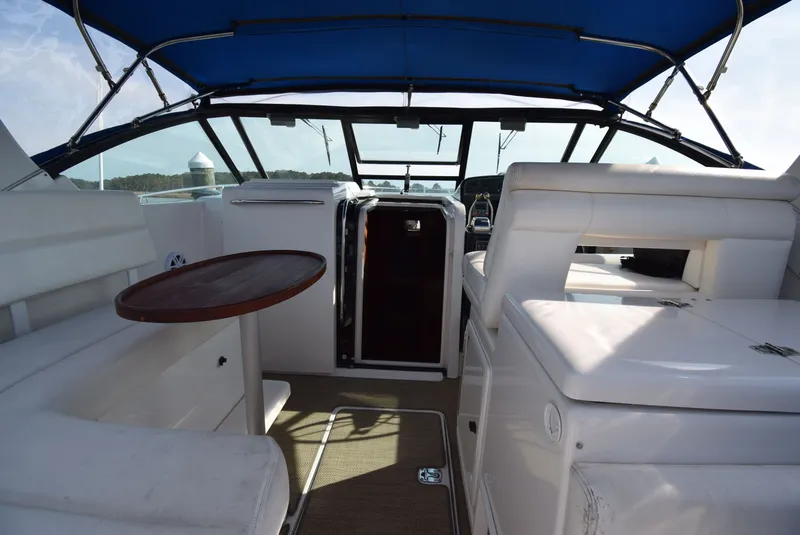 Slide: The Image of Interior of 2001 Tiara Yachts 3500 Open with blue canopy. - 10