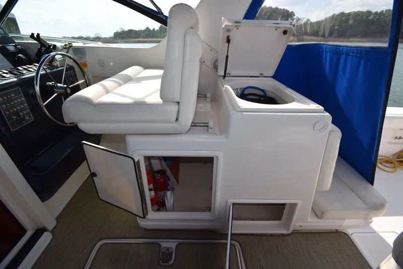 Slide: The Image of Interior of a 2001 Tiara Yachts 3500 Open with helm station. - 13