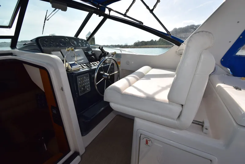 Slide: The Image of Interior view of 2001 Tiara Yachts 3500 Open helm station. - 14