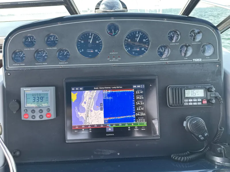 Slide: The Image of Dashboard of 2001 Tiara Yachts 3500 Open with navigation system. - 18