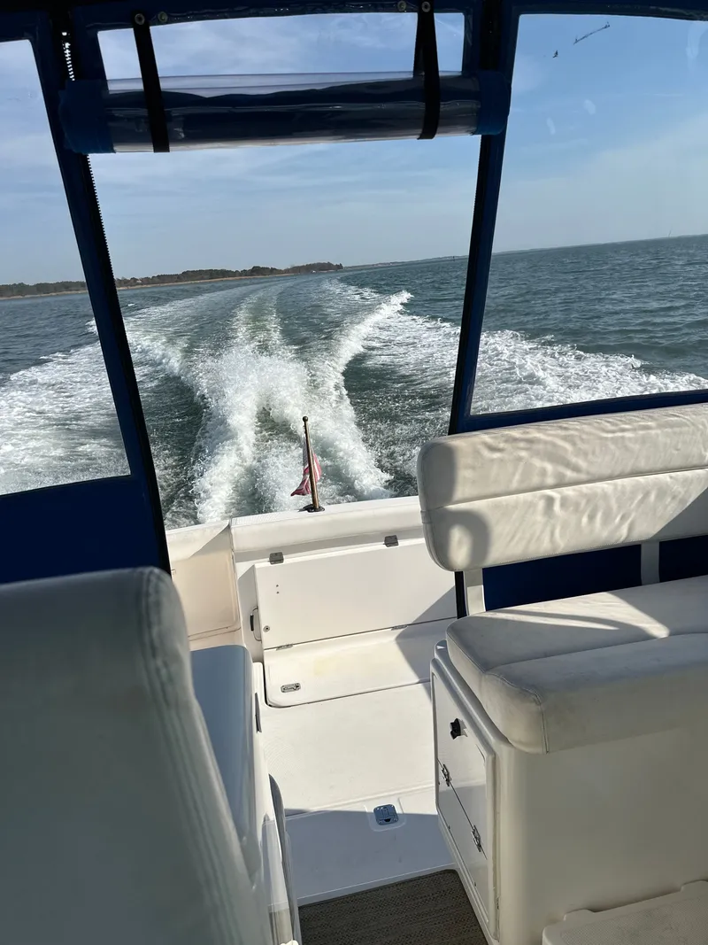 Slide: The Image of Interior view of a 2001 Tiara Yachts 3500 Open on the water. - 20