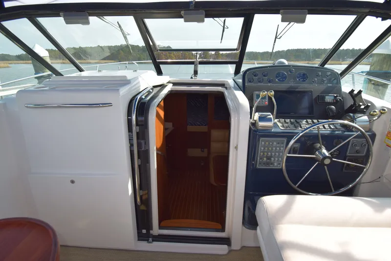 Slide: The Image of Interior view of 2001 Tiara Yachts 3500 Open helm station. - 27