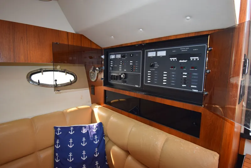Slide: The Image of Interior of 2001 Tiara Yachts 3500 Open with control panel. - 30