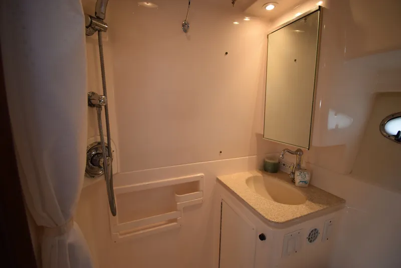 Slide: The Image of Tiara Yachts 3500 Open 2001 bathroom with shower and sink. - 36