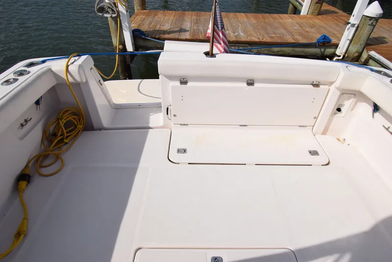 Slide: The Image of Tiara Yachts 3500 Open 2001, spacious deck at dock. - 45