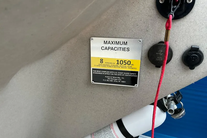 Slide: The Image of 2018 Avalon GS Cruise II boat capacity plate showing maximum weight and passenger limits. - 7