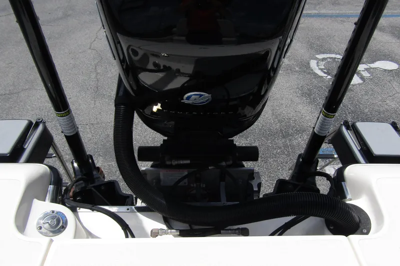 Slide: The Image of 2023 ShearWater 260 Carolina Flare boat engine and controls, viewed from above. - 11