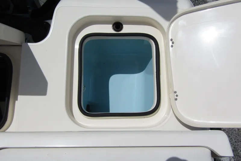 Slide: The Image of Open storage compartment on 2023 ShearWater 260 Carolina Flare boat. - 16