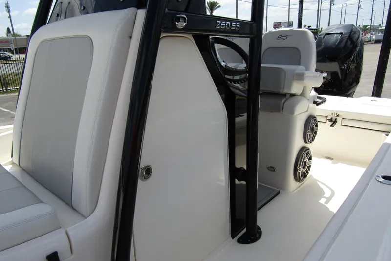 Slide: The Image of 2023 ShearWater 260 Carolina Flare boat interior with seating and speakers. - 28