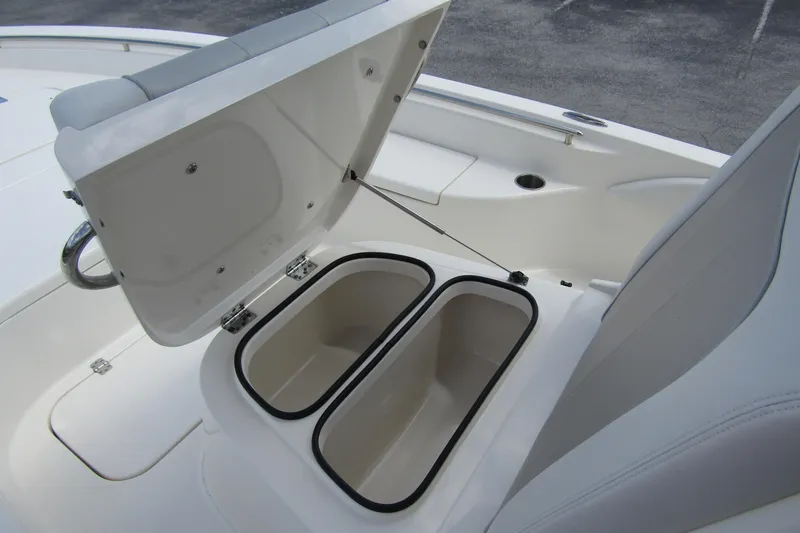 Slide: The Image of 2023 ShearWater 260 Carolina Flare boat storage compartments open on deck. - 32