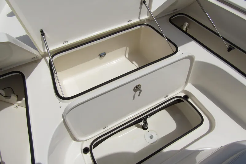 Slide: The Image of 2023 ShearWater 260 Carolina Flare boat storage compartments, open and spacious design. - 37