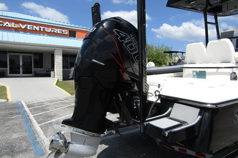 Slide: The Image of 2023 ShearWater 260 Carolina Flare boat with Mercury 400 outboard motor at dealership. - 4