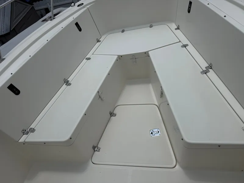 Slide: The Image of Interior view of a 1999 Pursuit 2870 Center Console boat. - 37