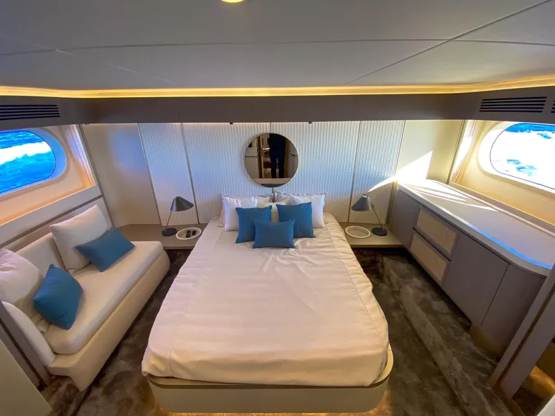 Slide: The Image of Luxurious bedroom interior of 2025 Azimut Magellano 60 yacht with modern design and ocean view. - 13