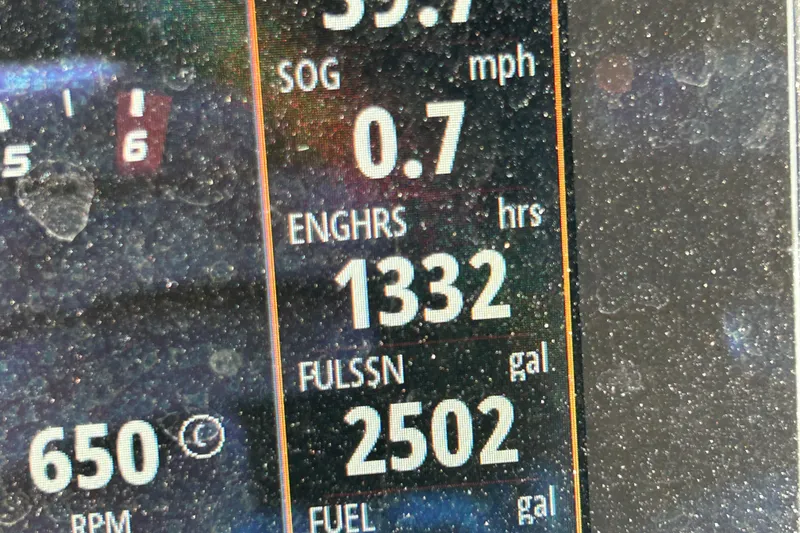 Slide: The Image of Dashboard display of a 2023 Bennington 22 SSR showing speed, engine hours, and fuel consumption. - 20