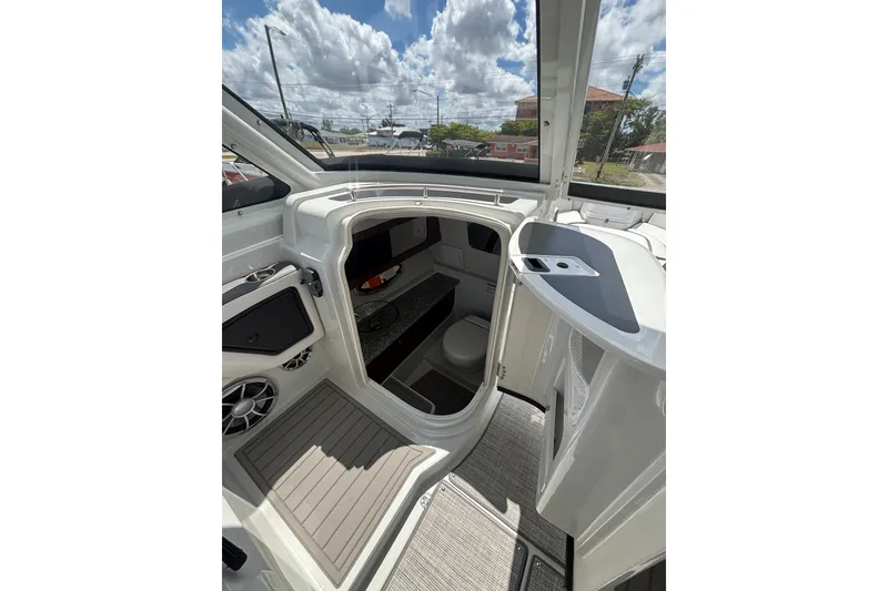 Slide: The Image of Interior view of 2026 Crownline 280 DC boat, showcasing modern design and amenities. - 15