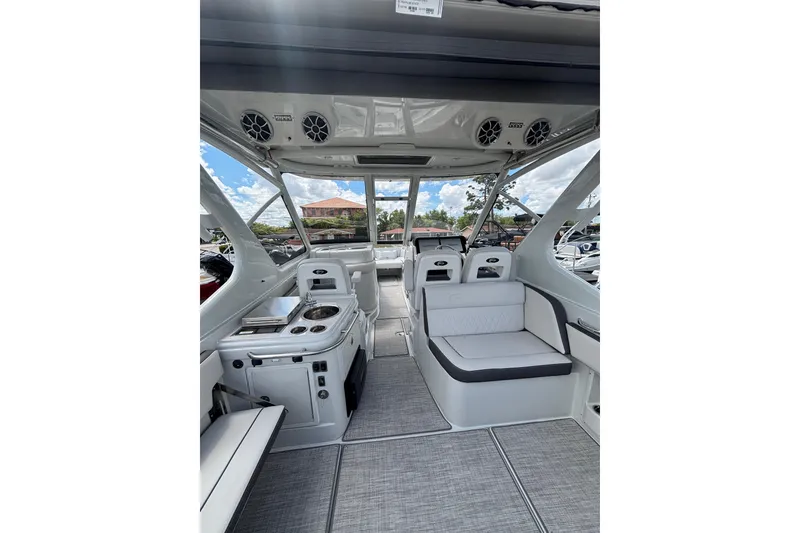 Slide: The Image of Interior of 2026 Crownline 280 DC boat, featuring sleek seating and modern amenities. - 25