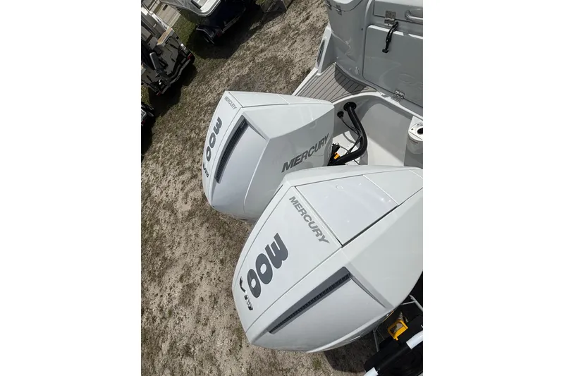 Slide: The Image of Twin Mercury 300 outboard engines on a 2026 Crownline 280 DC boat. - 5