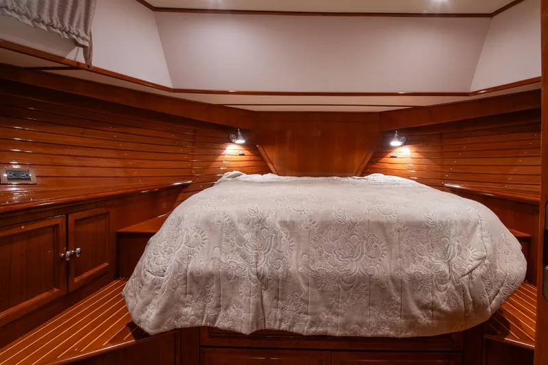 Slide: The Image of Luxurious cabin interior of 2007 Grand Banks 39 Eastbay SX with elegant wood paneling. - 31